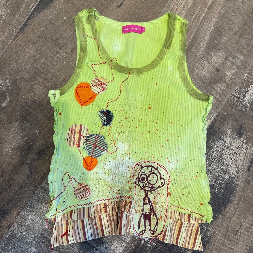 Super cute tank top with lots of details!